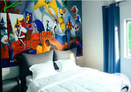 吴起对于酒店的墙体彩绘而言更注重哪些方面？